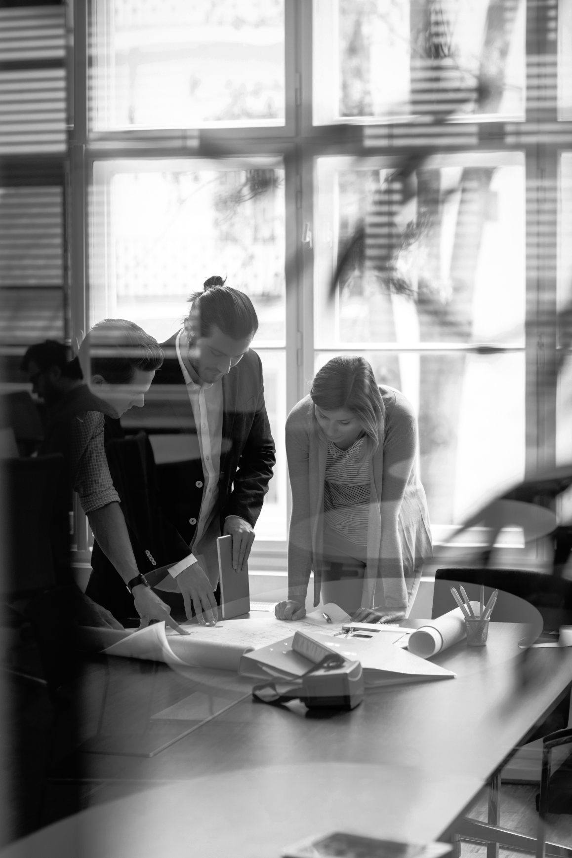 business-people-with-digital-tablet-blueprint-sm